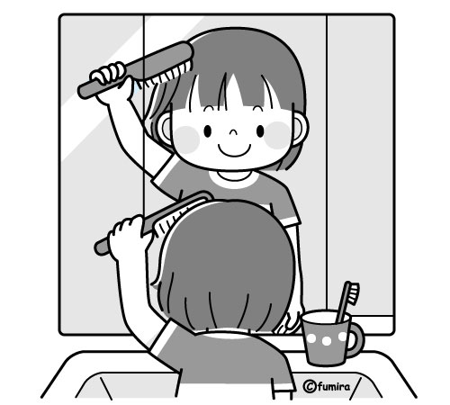 髪の毛をとかす女の子（モノクロ）