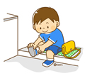 子供・男の子の生活イラスト 玄関で靴をはく男の子