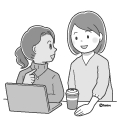 パソコンに向かっている外国人の女性と話しかける日本人女性(モノクロ) パソコンに向かっている外国人の女性と話しかける日本人女性(モノクロ)
